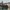 Panoramic view of Basel, Switzerland, showing the Rhine River, historic city center, and modern architecture.