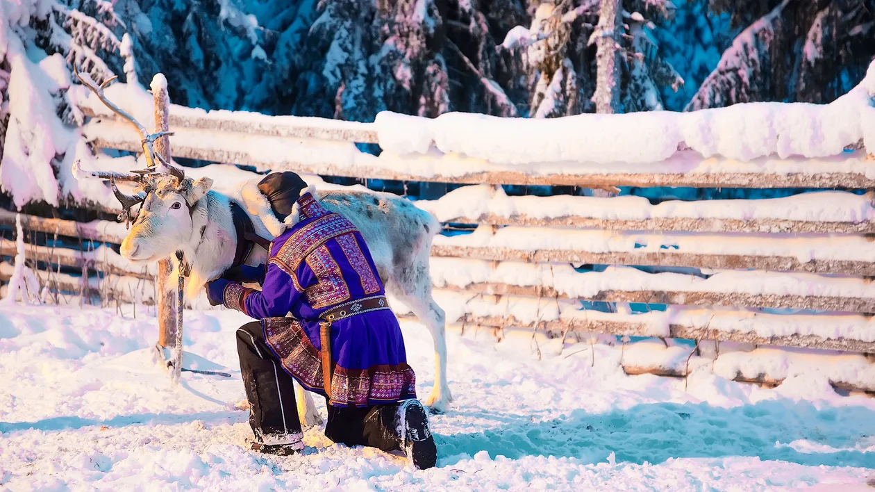 Man in Sámi traditional clothes in Lapland, Finland.