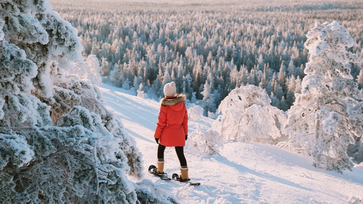 Snowshoeing - Immerse yourself in the breath-taking Finnish scenery on your snowshoe adventure through one of Finland’s 41 national parks. © Matt Cherubino