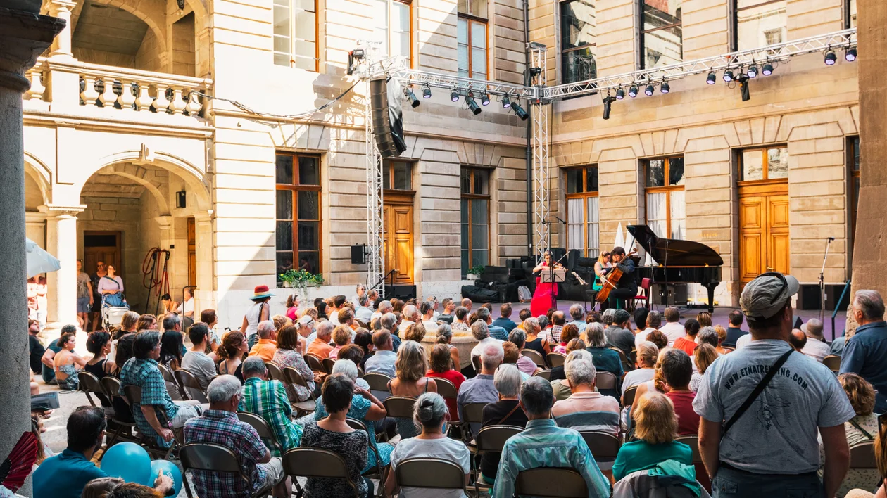 People enjoying a Festival of Classical Music concert