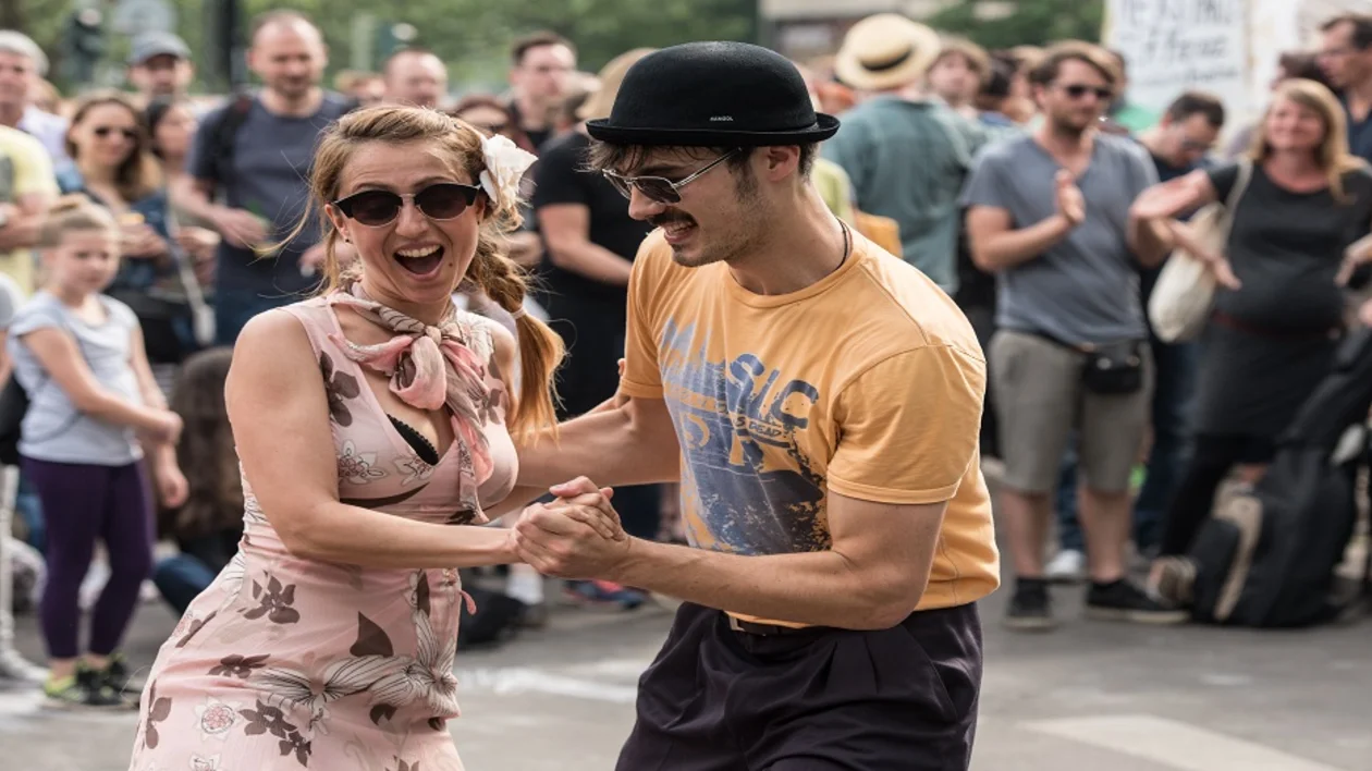 Dance in the streets — maybe with a friendly stranger! — in Berlin, during the Carnival of Cultures celebration.