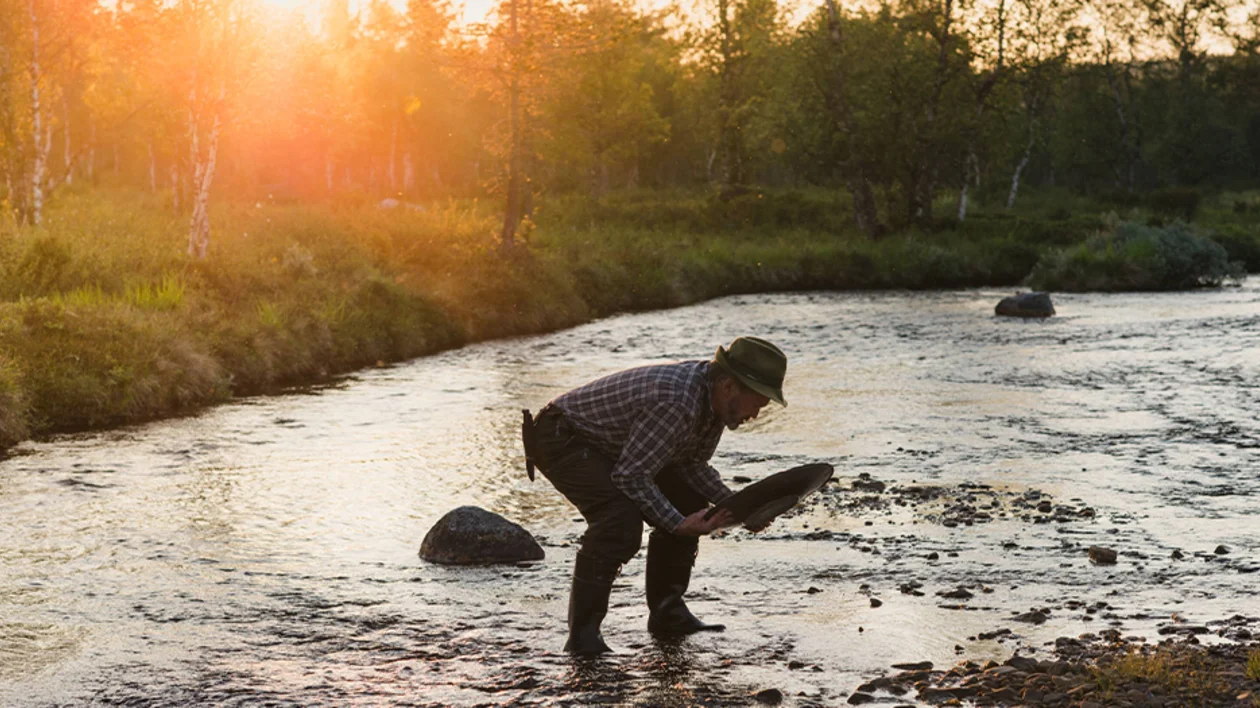 Finnish Gold Panning Championships under the golden midnight sun.