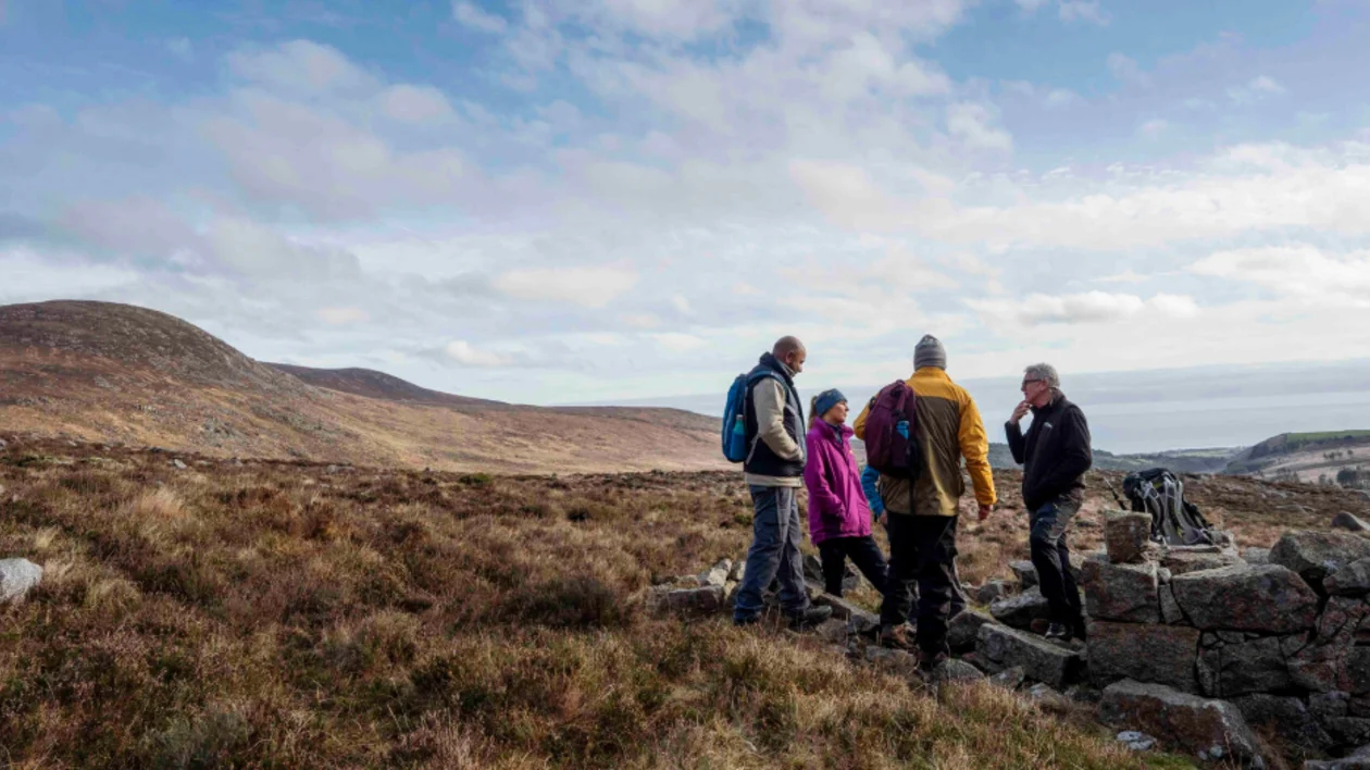Adventurers in the Mourne Mountains in County Down