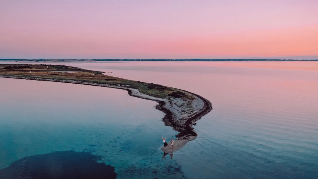 Landscape of south fyn archipelago with two women on it.