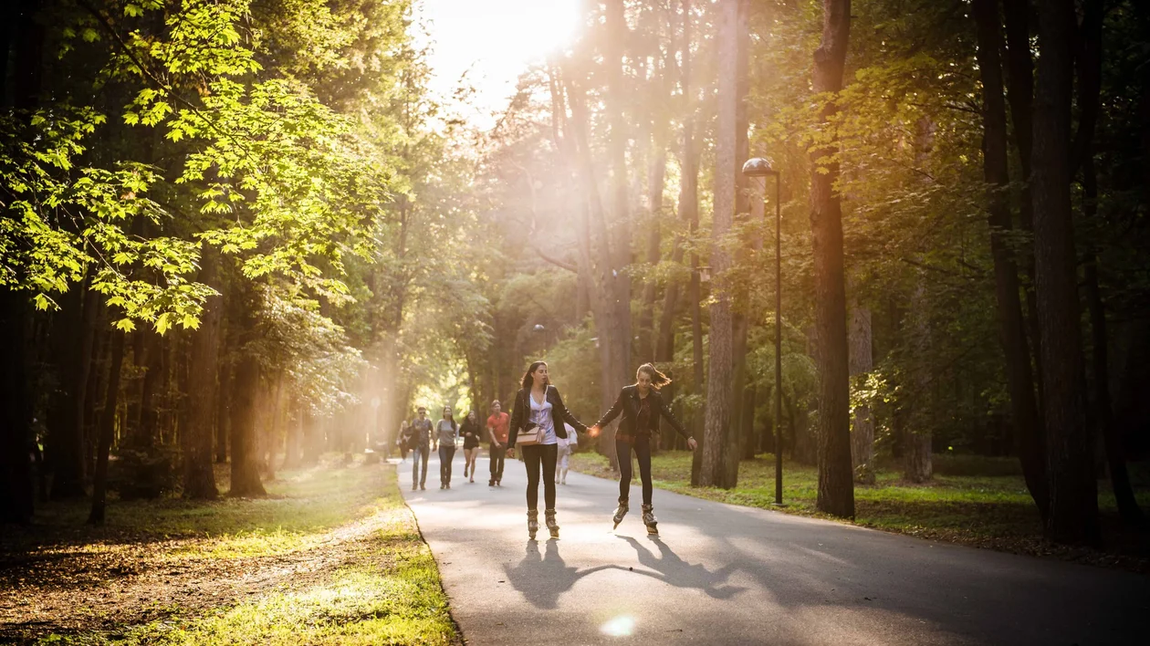 Vingis Park in Vilnius and a bunch of people strolling.