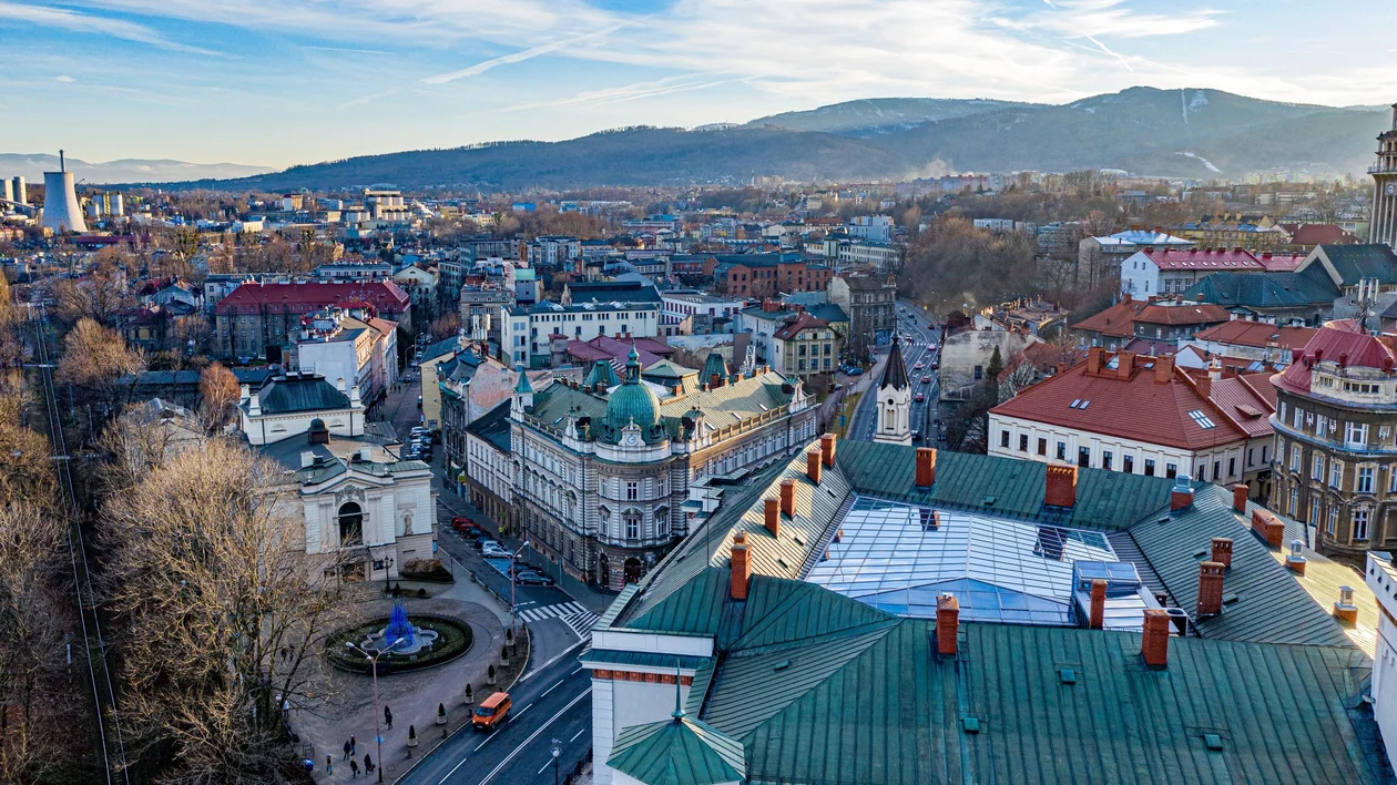 Aerial view of Bielsko-Biała, Poland’s 2026 European Capital of Culture, showing historic architecture against a mountain backdrop.