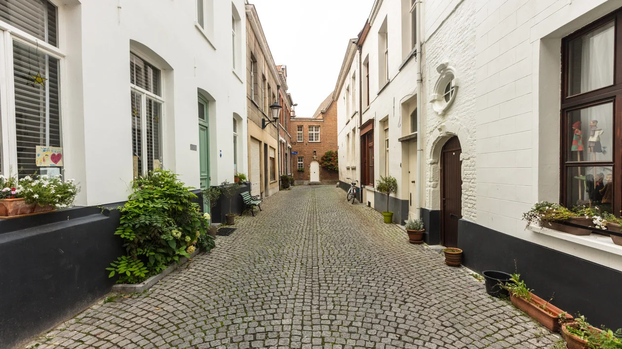 Quiet cobblestone alley in historic Mechelen, Belgium
