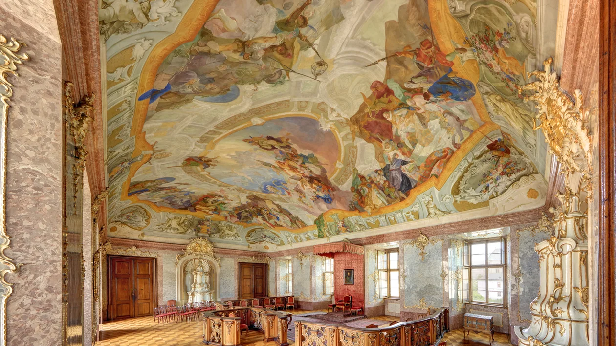 Baroque ceremonial hall with frescoed ceiling inside Kroměříž Chateau, Czech Republic.