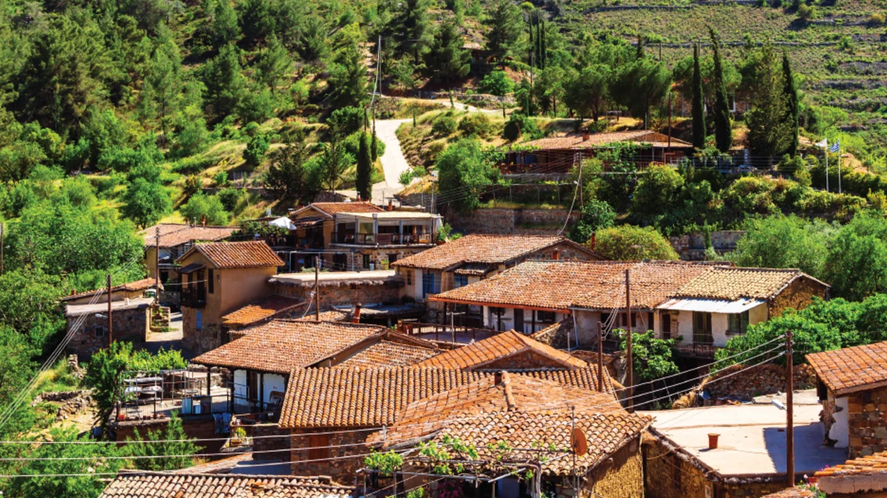 Traditional stone houses with red-tiled roofs in a Cypriot mountain village