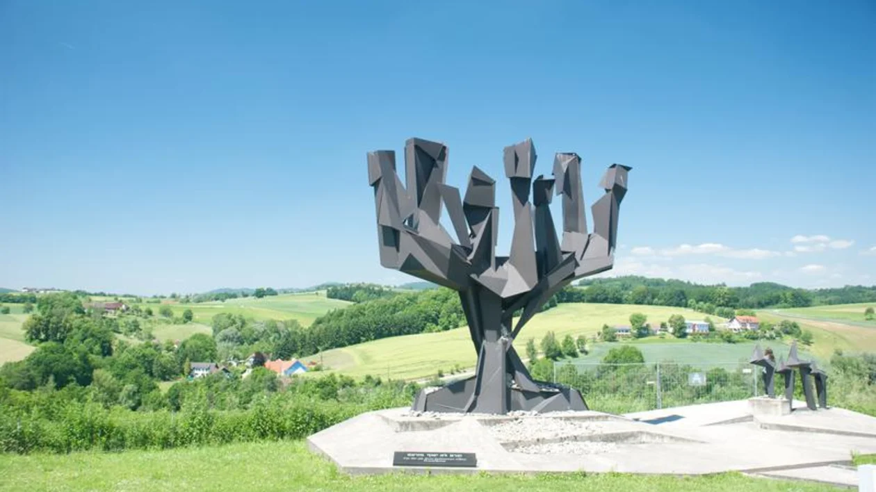 See the memorial statue that stands tall at Mauthausen-Gusen.