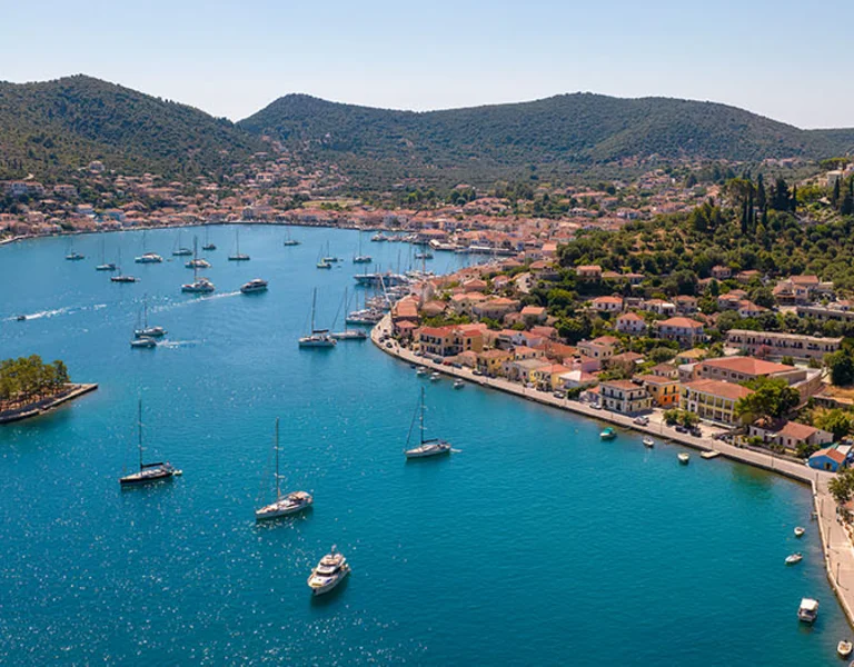 Aerial view of a sailboats moored in the picturesque port of Vathy village, the capital of Ithaca island, Ionian, Greece.