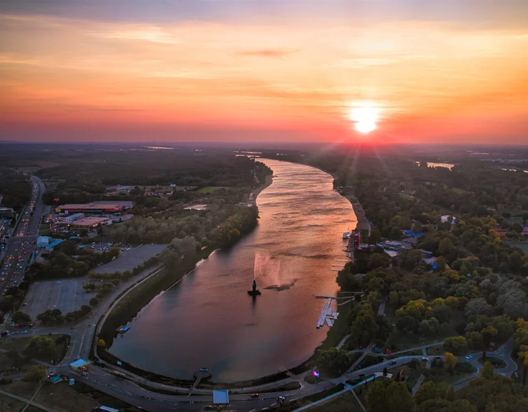 Admire sunset over the Sava River as you revisit the day's adventures.