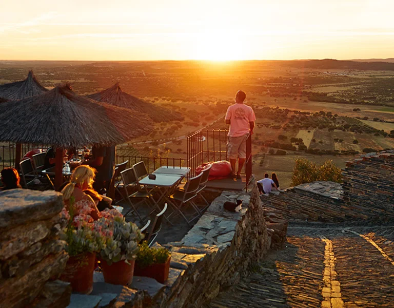 “Medieval Castelo de Monsaraz perched on a hill above the Alentejo plain in Portugal