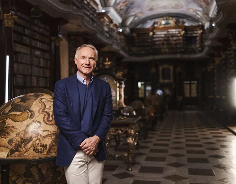 “Baroque interior of the Klementinum in Prague with ornate ceilings, frescoes and historic globes