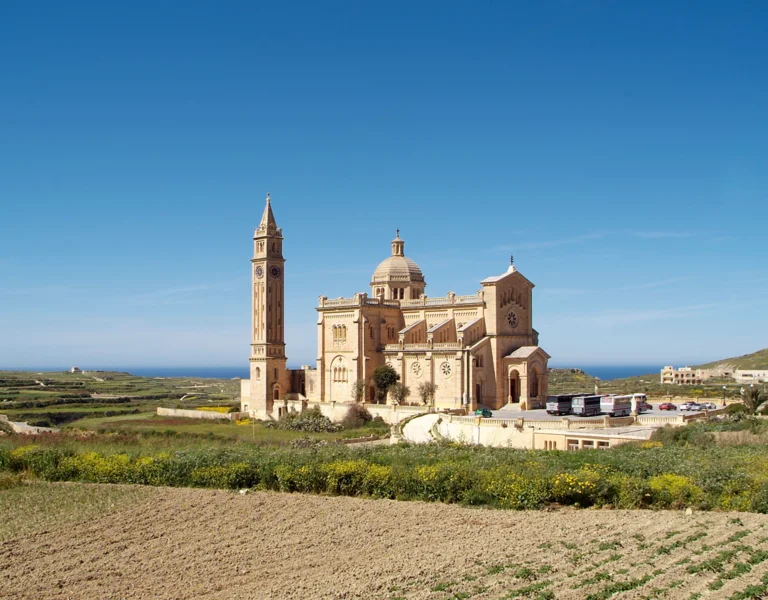 Ta’ Pinu Basilica rising above rural fields on the island of Gozo, Malta