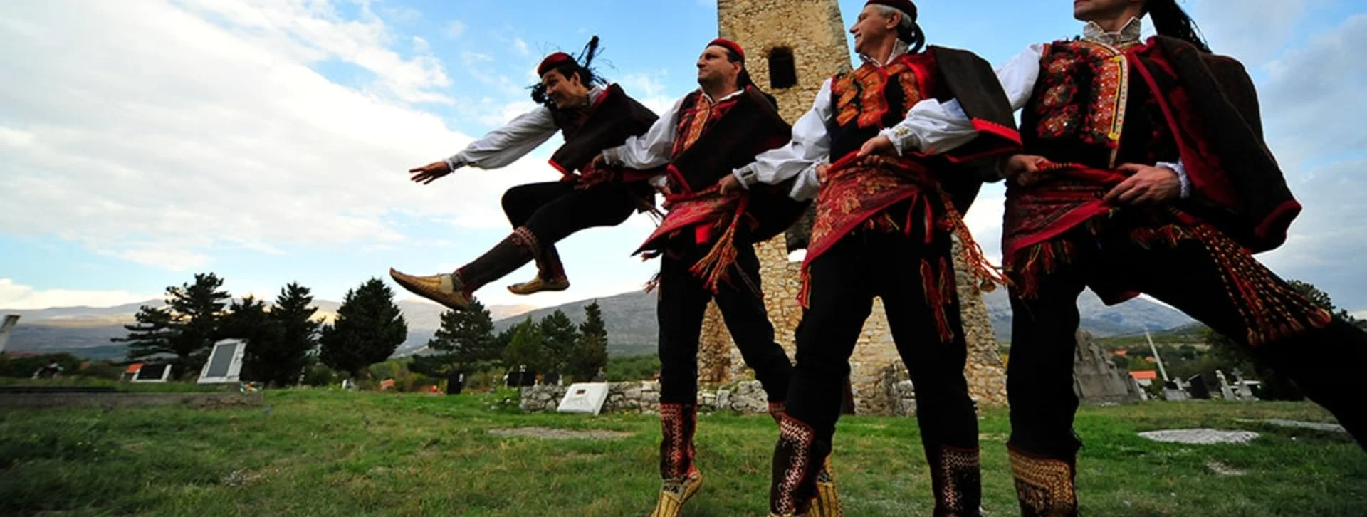 Be alert to snap a photo of the simultaneous jump of the dancers in the Dalmatian hinterland, Croatia