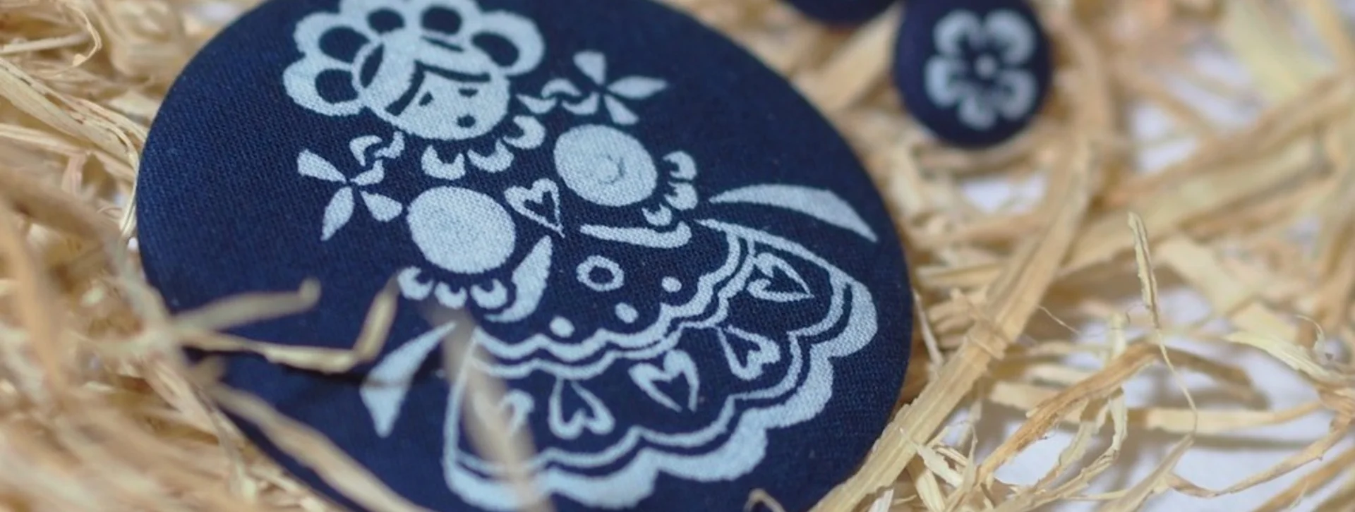 Add a chic piece of blueprint jewellery to your jewellery collection. You can buy it or make it by yourself at the Folk Art Production Centre (ÚĽUV).