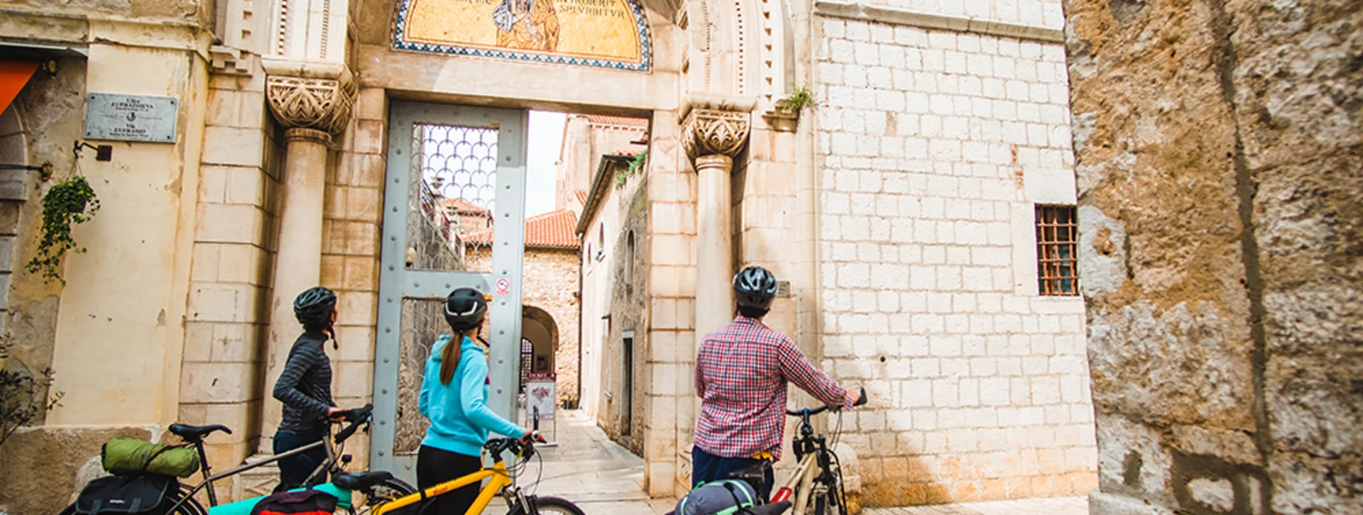 Cycling through the historic center of Poreč.