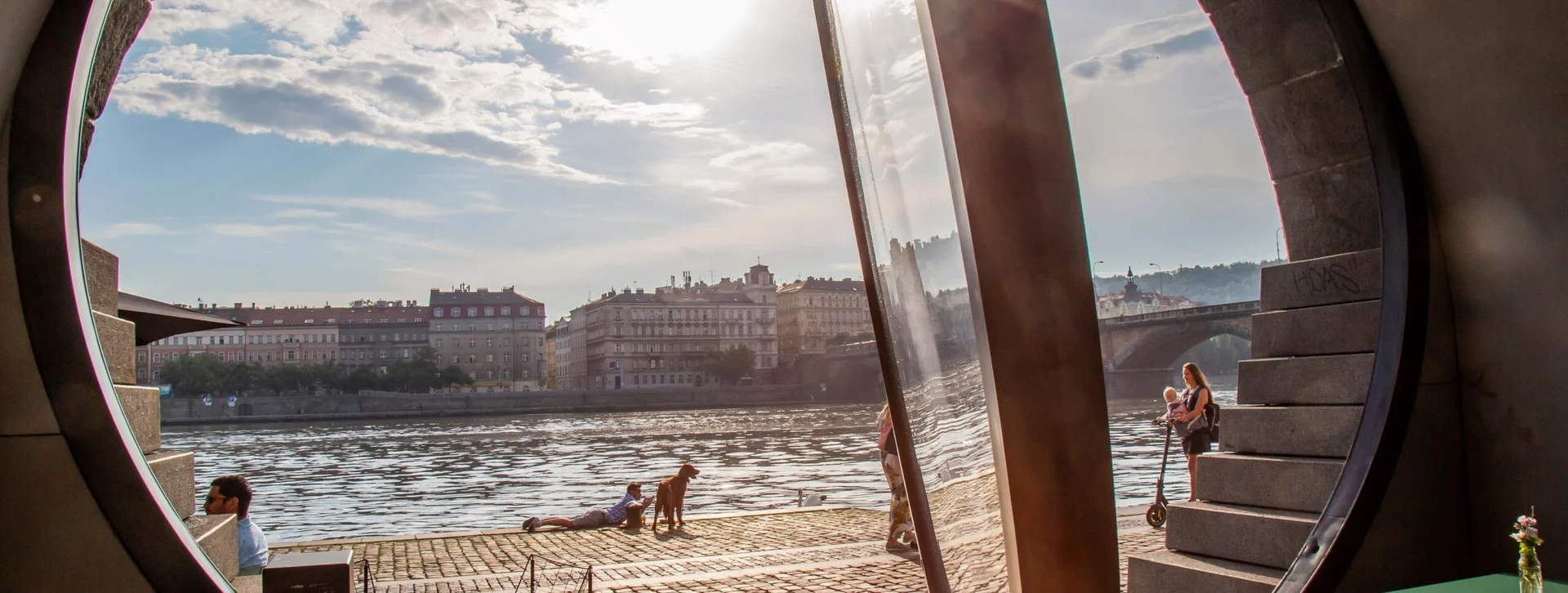 Enjoy sparkling views from Prague's Naplavka cell restaurant on the embankment.