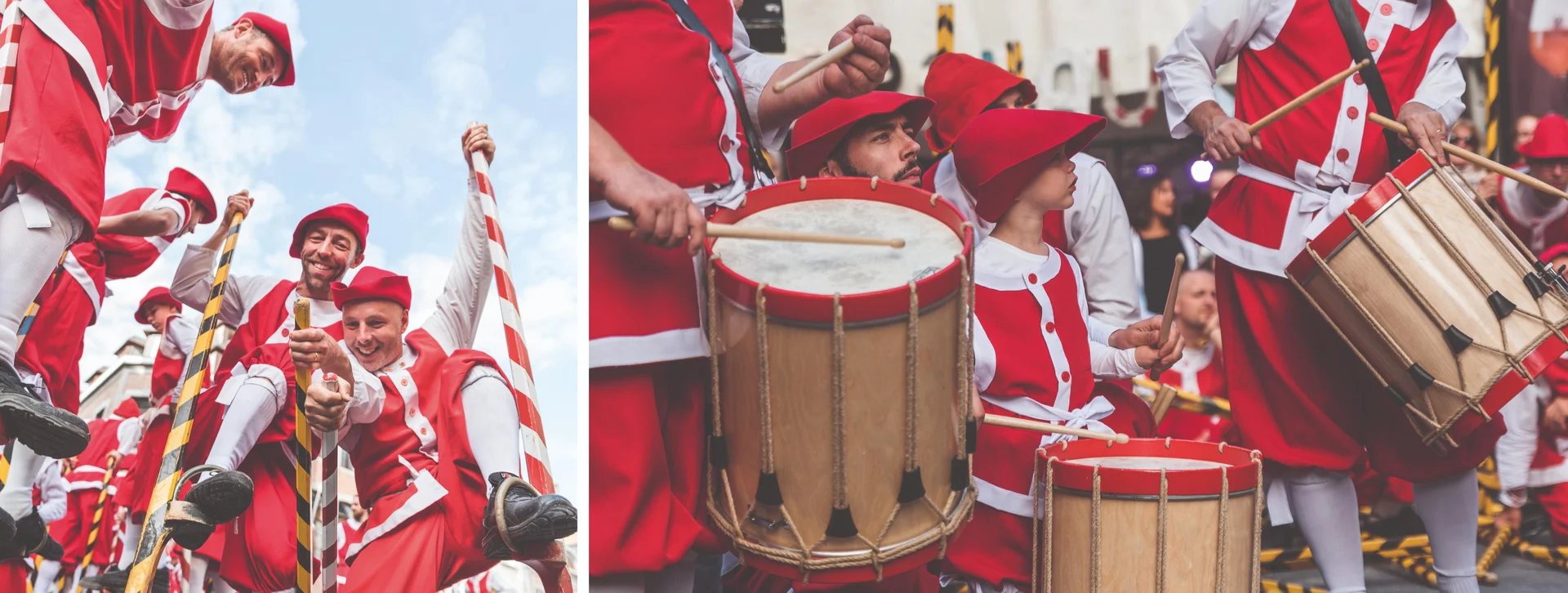Festival participants in red and white costumes playing drums and performing in the street.