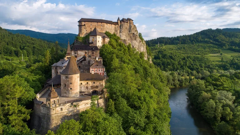 Stop at the highly photogenic Orava Castle you may know from the Netflix series Dracula. Do you dare to go on a night tour?