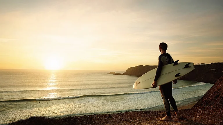 Ready to surf the famous waves at Praia da Arrifana?