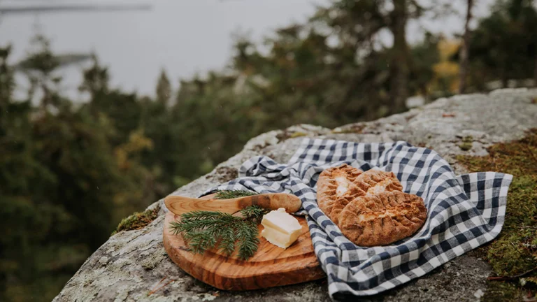 Make sure to indulge in the local delicacy Karjalanpiirakka (Karelian pie) and enjoy the scenic views across the national landscapes when venturing through North Karelia.