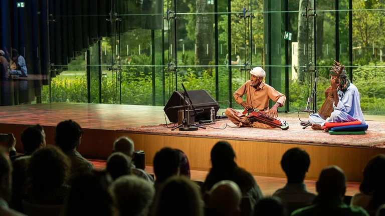 Seize the opportunity to hear artists such as Ustad Noor Bakhsh, pictured here performing in the Concert Hall in the Concert House of Music Hungary.