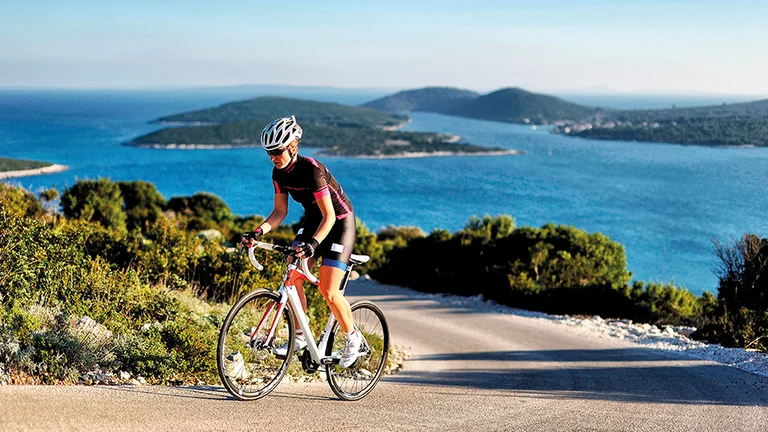 Lošinj island by bike, breathtaking views of sea and sky.