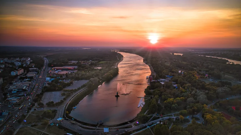 Admire sunset over the Sava River as you revisit the day's adventures.
