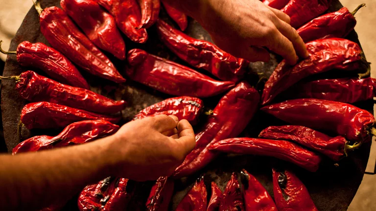 Eat the color of red peppers with your eyes before you enjoy them in a meal.