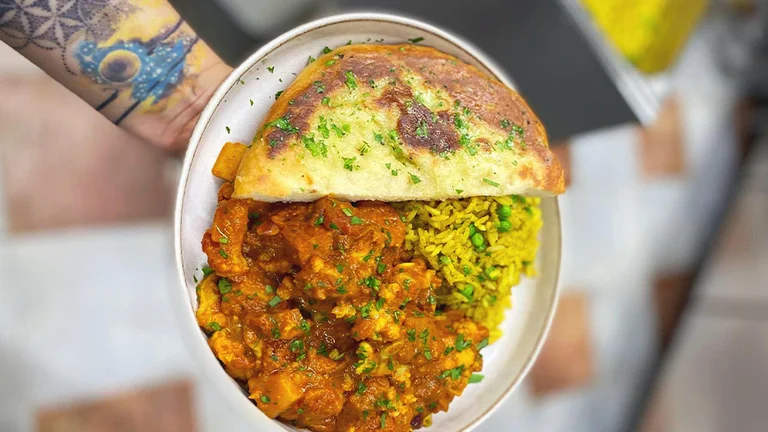 Tuck in to Balans Bistro's vibrant Indian curry to keep you well-fueled for sightseeing.