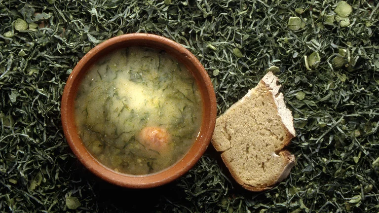 Be comforted with a traditional bowl of "Caldo Verde," a Portuguese soup made with finely shredded greens and potatoes.