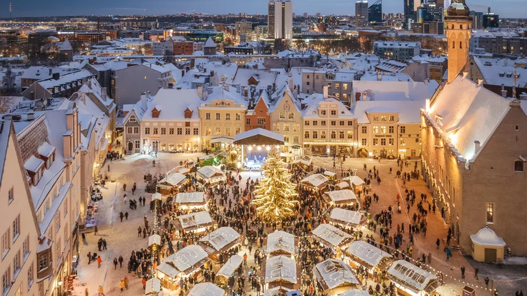 Aerial view of the christmas Market in Tallinn with snow.