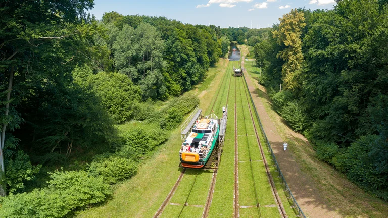 A boat being transported on rails along the Elbląg Canal in Poland.