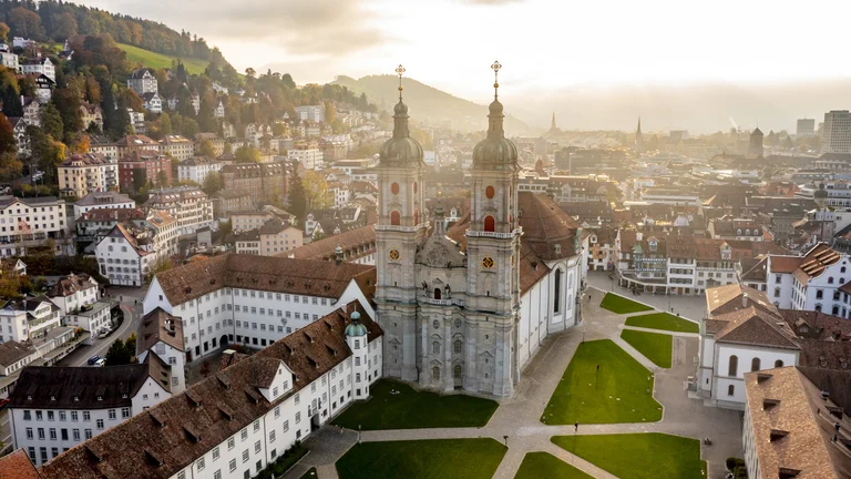 Aerial view of St. Gallen church in Switzerland with the surrounding landscape.