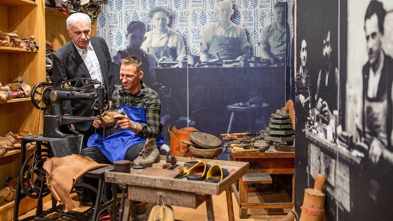 Visitors exploring traditional leather craftsmanship at the Museum of Leather Industry in Šoštanj, Slovenia.