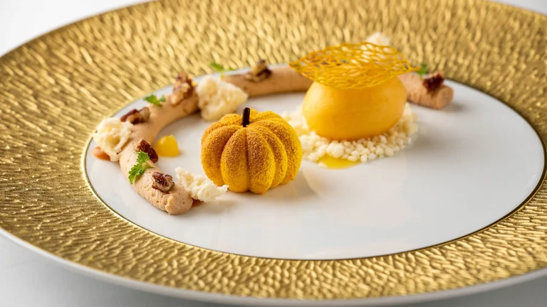 Gourmet plated dessert at Michelin-level restaurant in Zlín.