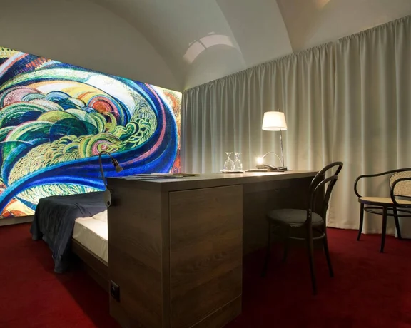 Enjoy the very personal exhibition in the Invisible hotel, that opens solely with your key