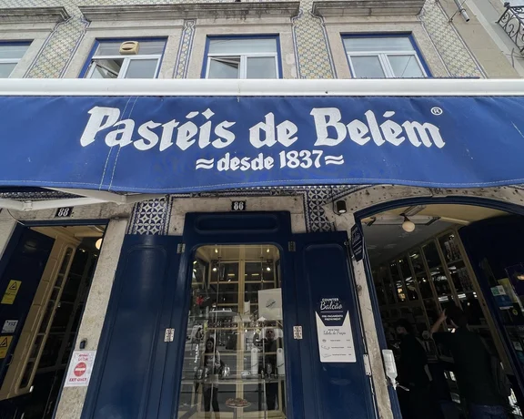 Taste the classic pastel de nata at Antiga Confeitaria de Belém, Lisbon, Portugal
