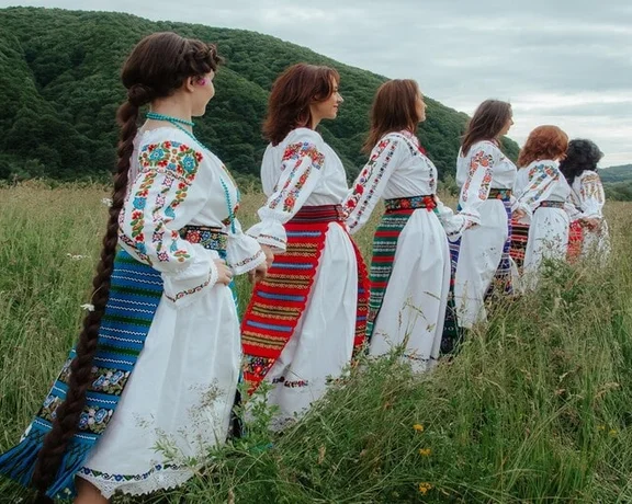 You'll feel that you're stepping back in time when you see women in folk dress in Bistrița - Năsăud, Romania