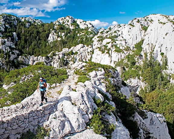 Explore the limestone terrain of Rožanski Kukovi, a Strictly Regulated Reserve