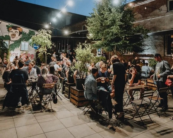 Like to meet the locals? Do it in style - with a tasty cocktail in hand and street art behind your back at the Tabačka Kulturfabrik