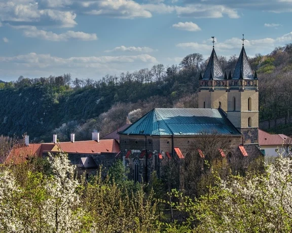 See several styles at the fortified Benedictine monastery in Hronský Beňadik; perched on a rocky outcrop, it features a blend of architectural styles, predominantly Gothic and with hints of Renaissance and baroque influences.