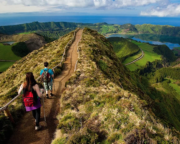 Hike the Sete Cidades Trail in the Azores for stunning views.