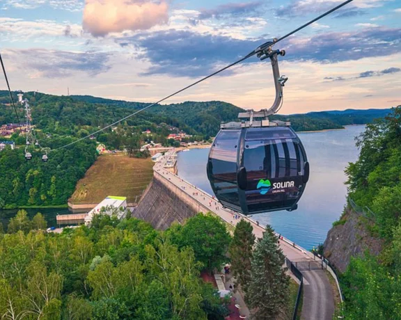 Get a bird's eye view from the Solina Cable Car as it crosses over the dam.