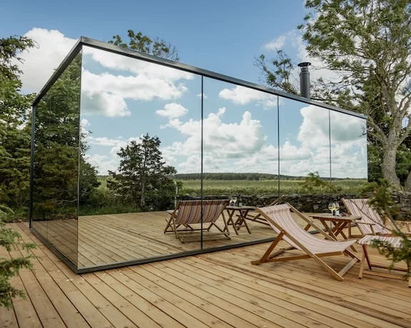 To decrease your carbon footprint while traveling, opt for Green Key accommodation like this mirrored cabin at Pilguse Residency.