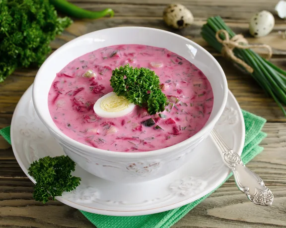 Cool your palate with aukstā zupa, a vibrant, cold pink soup made with beets, kefir, cucumbers, and fresh dill!