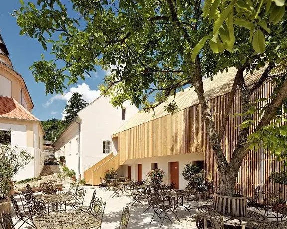 Relax in the fresh air under the trees at Café Fara in Klentnice.