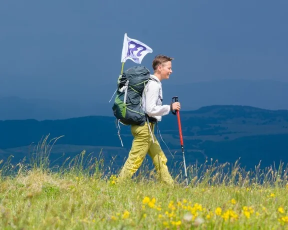 A man hiking in Romania.